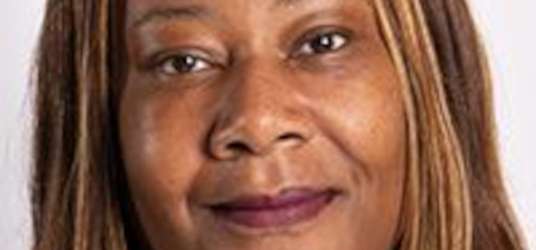 Close up hotograph of Kim Powell - a black woman